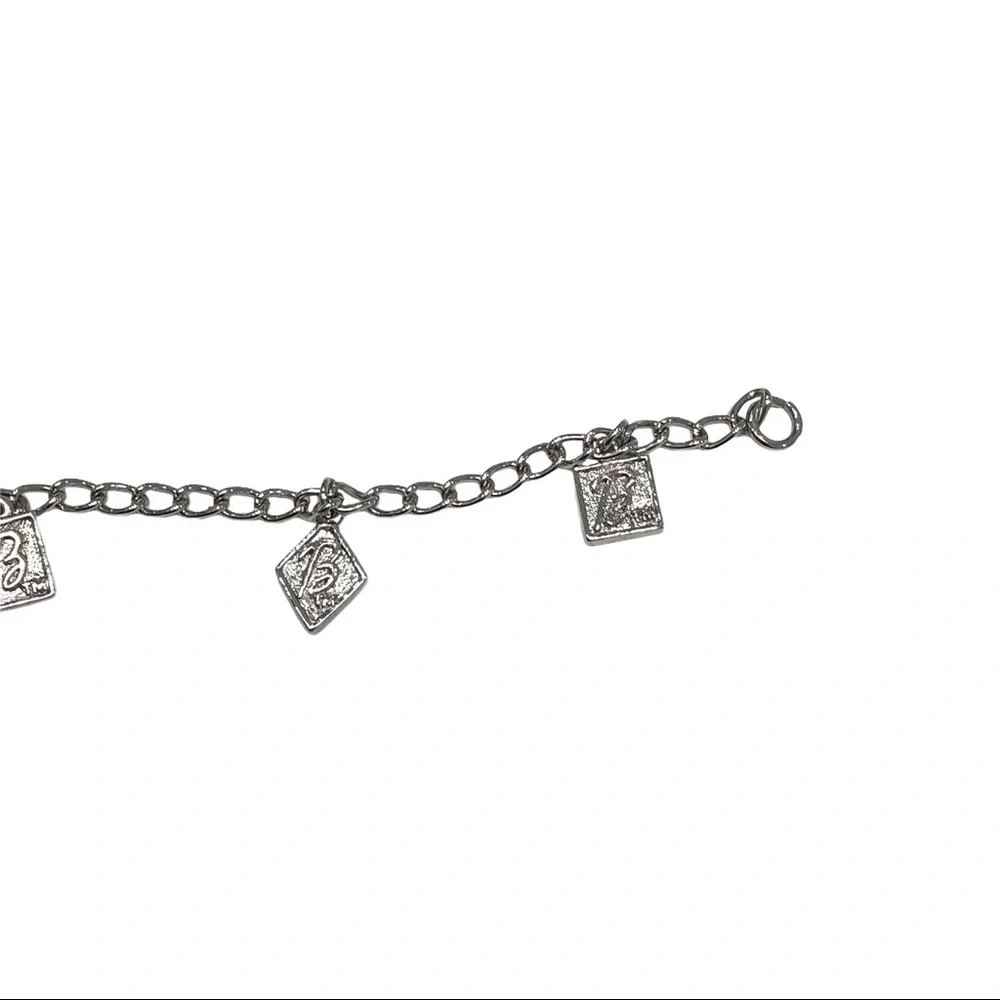 SILVER TONE BARBIE CHARM BRACELET